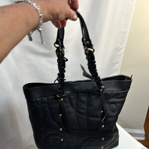 Gently used STUART WEITZMAN black leather Zippered Tote and inside zippe…